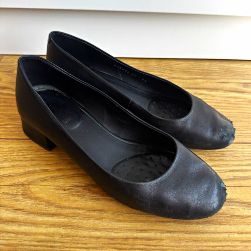 Well worn cabin crew shoes - worn,