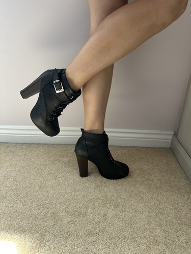 Well worn ladies boots - worn,